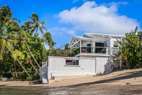 Westshore Beach House is situated on a secluded beach.