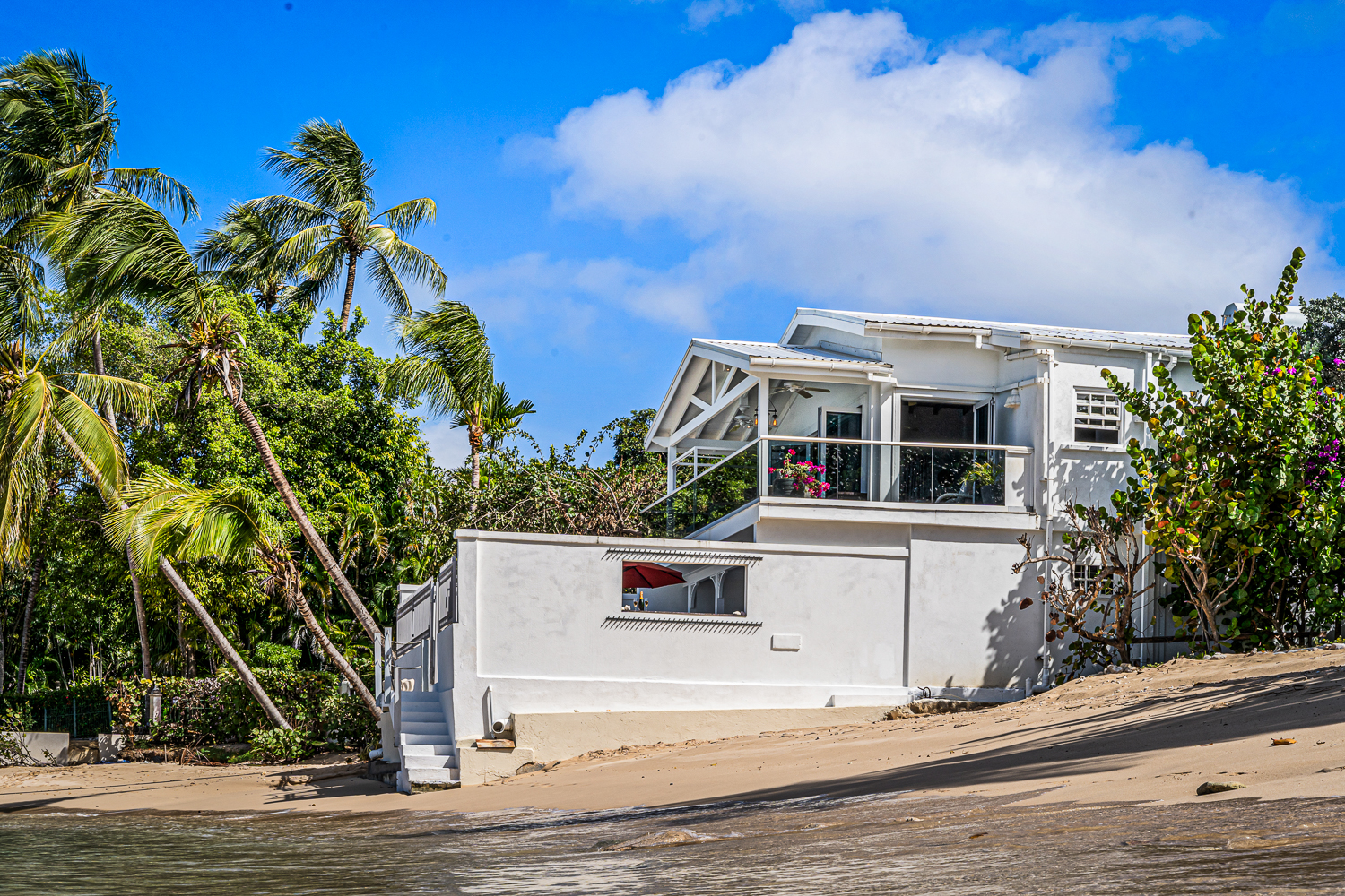 Westshore Beach House and its secluded beach.