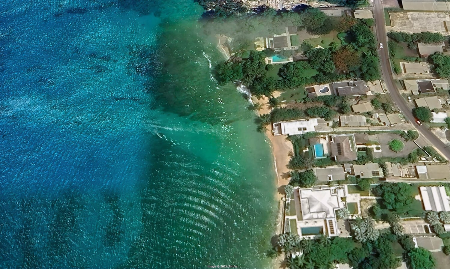 Aerial view of Westshore Beach House and the Caribbean Sea.