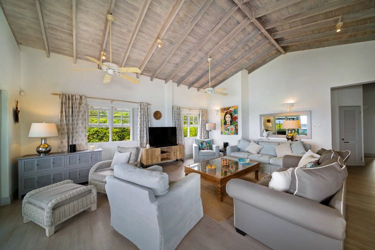Relax in comfort and style overlooking the Caribbean Sea.